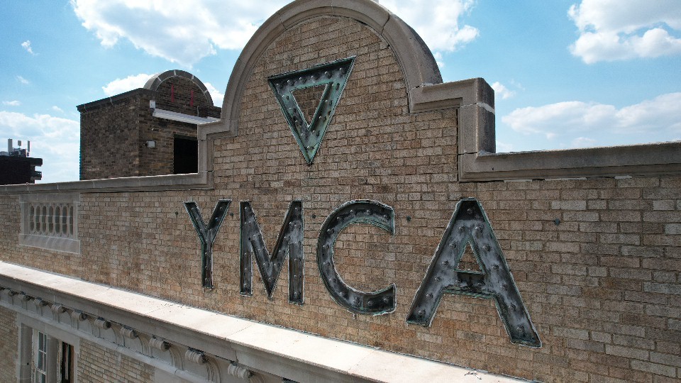 Sign on top of Allegheny YMCA Building