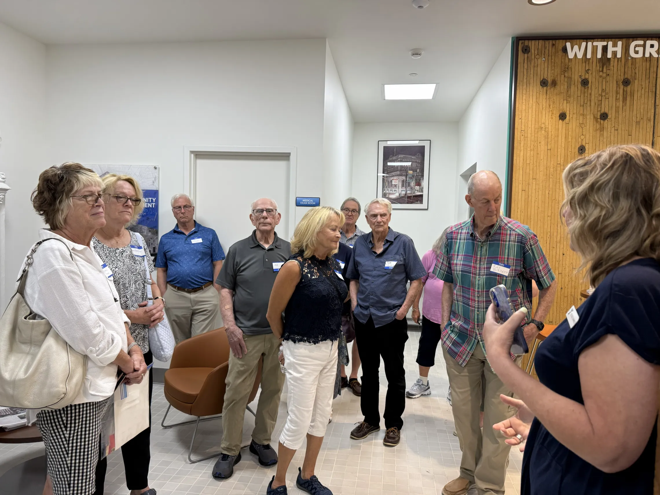 Allegheny swim team alumni see the newly renovated welcome center of the Allegheny Y.