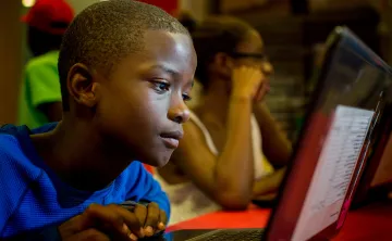 Homewood boy on computer