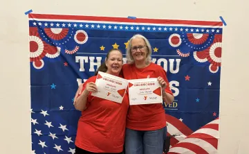 Two graduates from the veterans wellness initiative